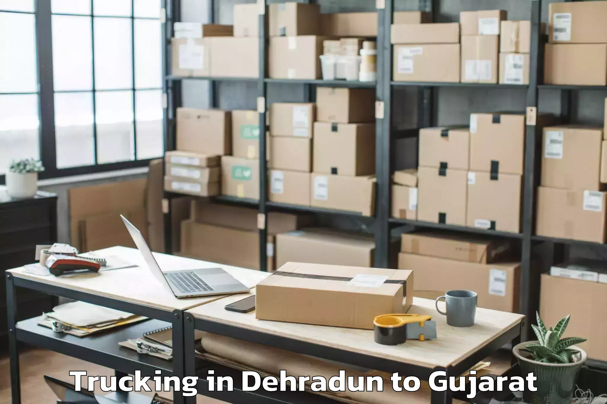 Get Dehradun to Dediapada Trucking